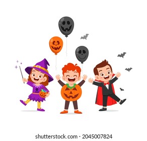 cute little boy and girl celebrate halloween with friend