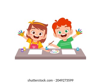 cute little boy and girl using paint to hand for art