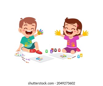 cute little boy and girl using paint to hand for art