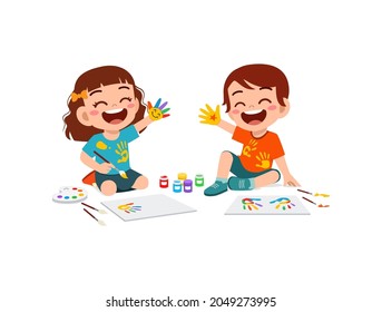 cute little boy and girl using paint to hand for art