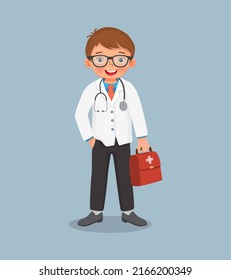 cute little boy with glasses wear doctor uniform holding medical bag. Job and occupation concept for educational purpose