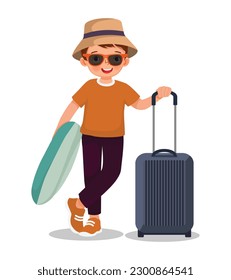 cute little boy in hat and sunglasses going for traveling holding inflatable ring on summer vacation