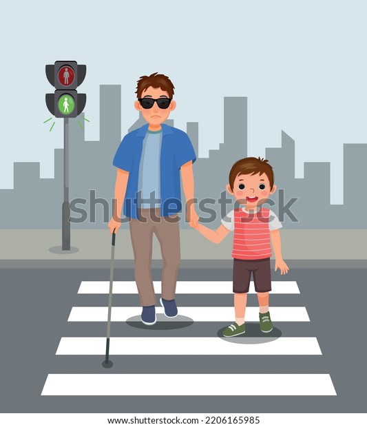Cute little boy helping blind man crossing street\
at the pedestrian traffic