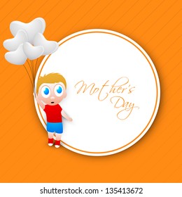 Cute little boy holding balloons and tag Mothers Day on yellow background.