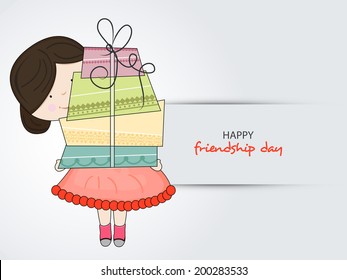 Cute little boy holding big gift boxes on grey background for Happy Friendship Day celebrations. 