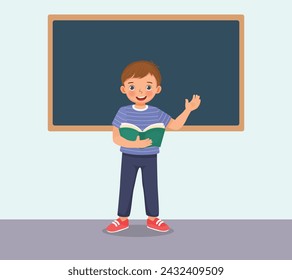 Cute little boy holding book standing in front of class reading speaking