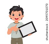 cute little boy holding digital tablet with finger pointing to empty screen or copy space for texts, messages and advertising content. Kids and electronic gadget devices concept for children.

