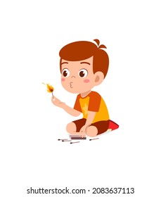 cute little boy holding match stick with fire