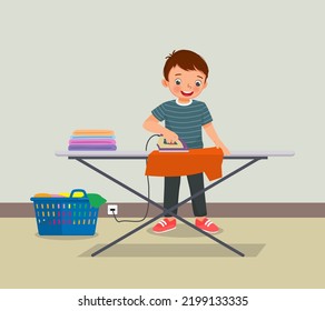 cute little boy ironing clothes doing daily chores housework activity