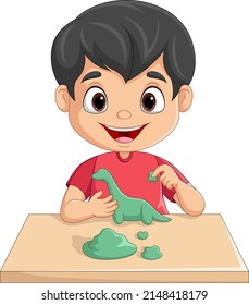 Cute little boy making dinosaur from clay