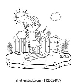cute little boy mounted in skateboard in the landscape