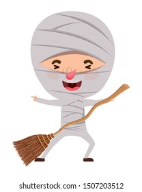 cute little boy with mummy costume and broom