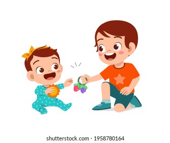 cute little boy play with baby sibling together