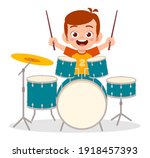 cute little boy play drum in concert