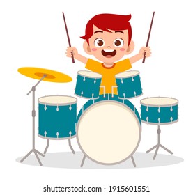 cute little boy play drum in concert