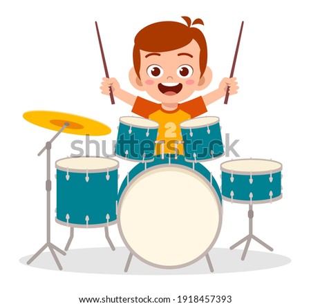 cute little boy play drum in concert
