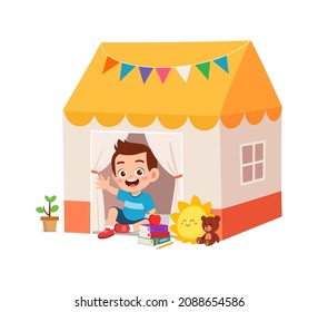 cute little boy play inside small tent