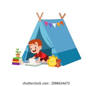 cute little boy play inside small tent