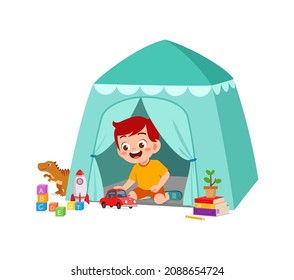 cute little boy play inside small tent