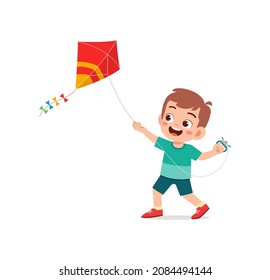 cute little boy play kite outside and feel happy