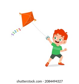 cute little boy play kite outside and feel happy