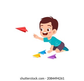 cute little boy play paper plane and feel happy