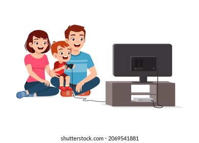 cute little boy play video game on big screen