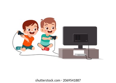 cute little boy play video game on big screen