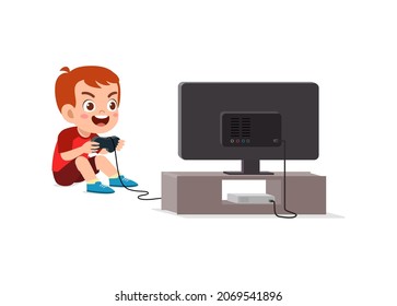 niño lindo jugar videojuego en pantalla grande