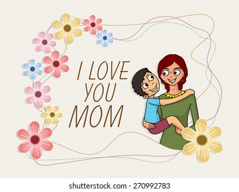 Cute little boy playing in his mother's lap and saying I Love You Mom on occasion of Happy Mother's Day celebration.