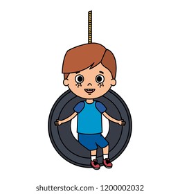 cute little boy playing in swing