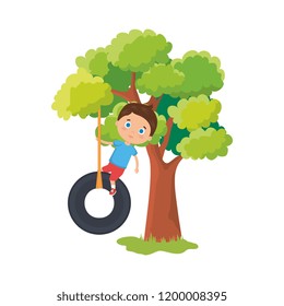 cute little boy playing in swing