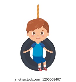 cute little boy playing in swing