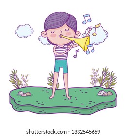 cute little boy playing trumpet in the landscape