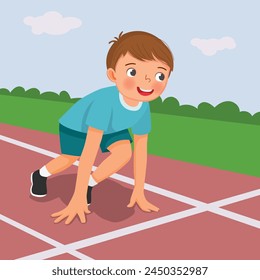 Cute little boy prepare to run on starting position at race track