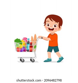 cute little boy push shopping cart full of groceries