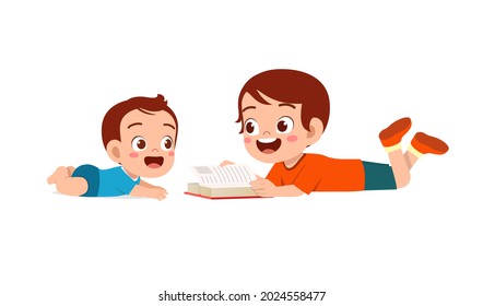 cute little boy read book with baby brother sibling together