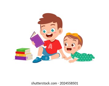 cute little boy read book with baby sister sibling together