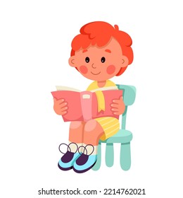 Cute little boy reading book vector illustration. Cartoon isolated child with red hair sitting on chair to read and study, happy preschool kid holding open book, learning information with curiosity