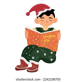 Cute little boy reading Christmas story white background
