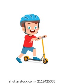 cute little boy riding scooter and wear helmet