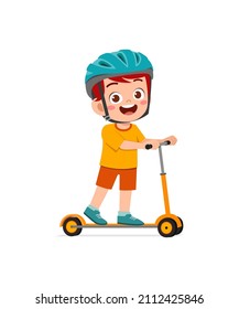 cute little boy riding scooter and wear helmet