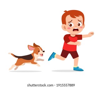 cute little boy scared because chased by bad dog