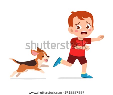 cute little boy scared because chased by bad dog