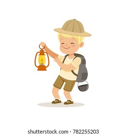 Cute little boy in scout costume with backpack holding gas lamp, outdoor camp activity vector Illustration svg