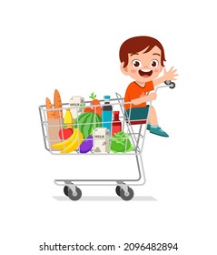 cute little boy sit on shopping cart