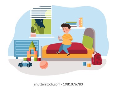 Cute little boy is sitting on bed at home in his bedroom using a digital tablet. Smiling kid enjoing his free time after school in cute room full of different toys. Flat cartoon vector illustration