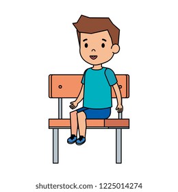 cute little boy sitting in schoolchair