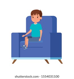 cute little boy sitting in sofa vector illustration design