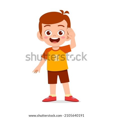 cute little boy stand and give salute pose